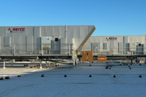 A large industrial building featuring air make-up units for enhanced ventilation.